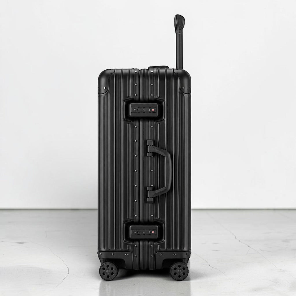 CASE.01 black aluminum suitcase with TSA locks and retractable handle. Cabin size.